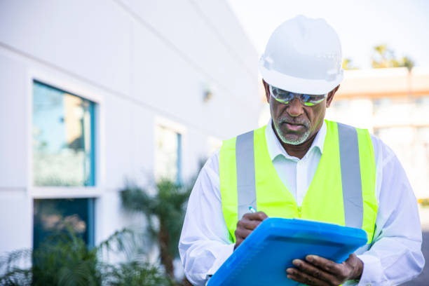 istock Senior Black Man Construction Manager Inspection 1207551227