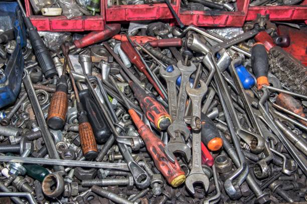Bunch of messy tools in a garage stock photo