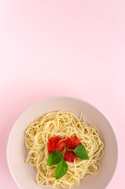istock Homemade Spaghetti with tomato and basil sauce 1207554112