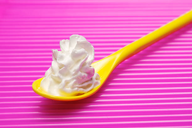 homemade yogurt  yogurt in a bowl  on black background.\nhomemade yogurt is healthier.