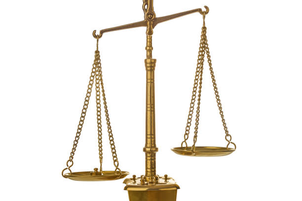 istock Golden weight balance scale 1207559838
