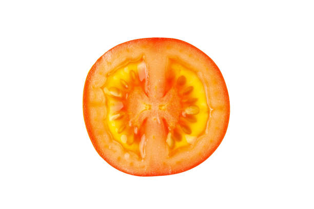 istock Thin slice of fresh red cherry tomato in incision, isolated on white background. Macro, flat lay. Horizontal, close-up. Healthy eating, farmer's product, raw food, keto diet concept 1207560205