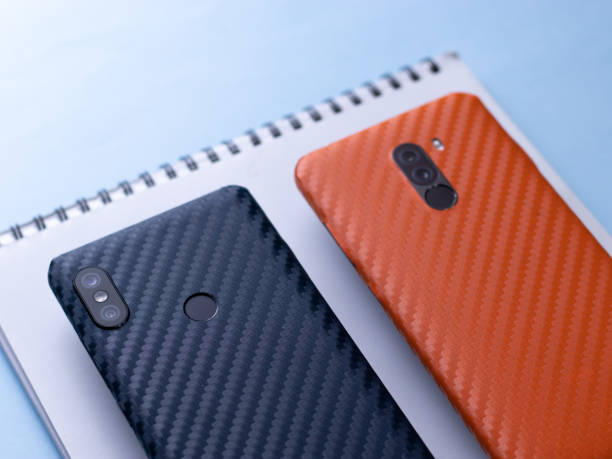 istock custom phone skin flatlay with different background colour. 1207560508