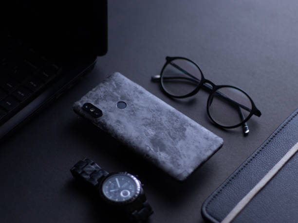 istock custom phone skin flatlay with different background colour. 1207561448