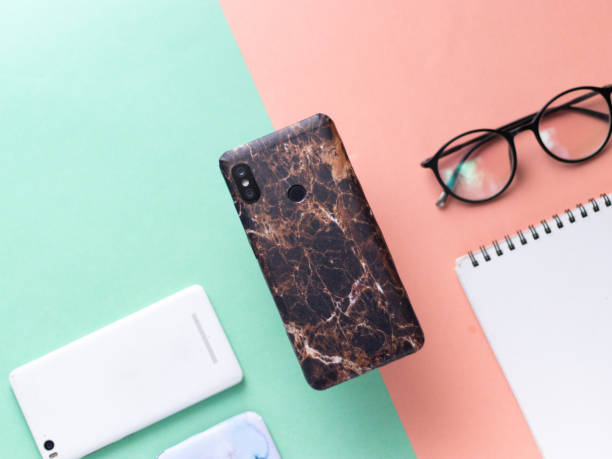 custom phone skin flatlay with different background colour.