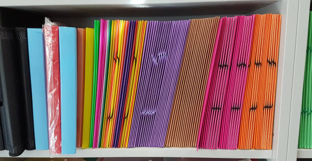 istock files folders envelopes many colors on selves 1207561789