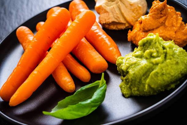 Carrots with hummus and guacamole