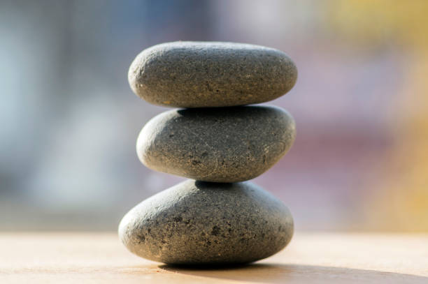 istock Three zen stones pile, grey meditation pebbles tower 1207564301