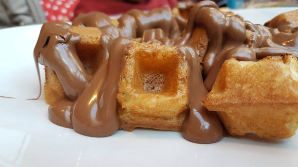 istock waffle sweet chocolated hot  liquid on the plate 1207564991