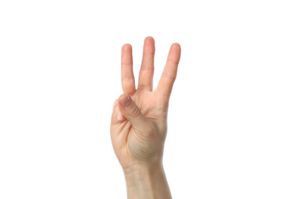 istock Female hand showing three fingers, isolated on white background 1207566121
