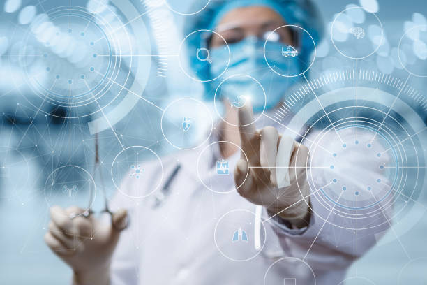 istock The doctor clicks on the stomach icon . 1207566765