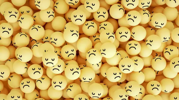 3d rendering of emoji with sad face. large group of objects. yellow background.