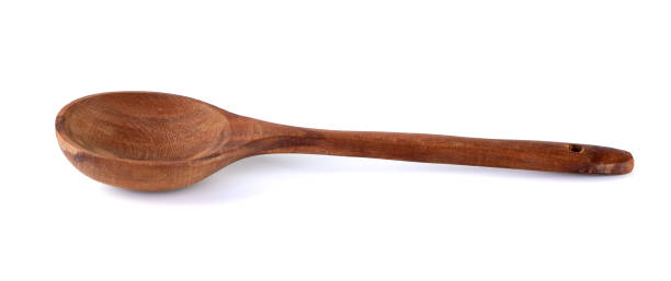 istock Wooden kitchen spoon isolated on white background 1207573707