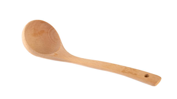 istock Wooden kitchen spoon isolated on white background 1207573849