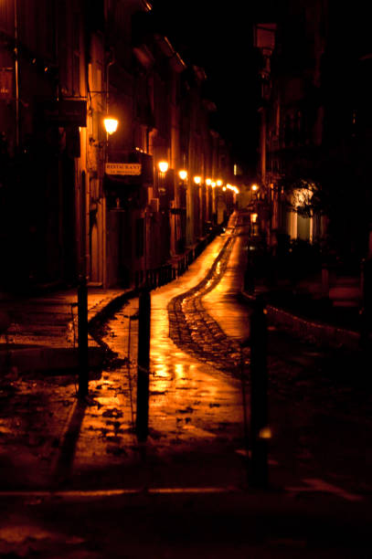 Narrow road on rainy night, Aix En Provence, France