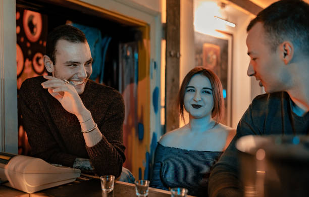 istock Friends drinking shots in pub 1207578322