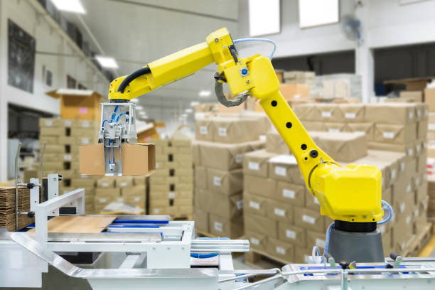istock Controller of industrial robotic arm for performing, dispensing, material-handling and packaging applications in production line manufacturer factory. 1207578386
