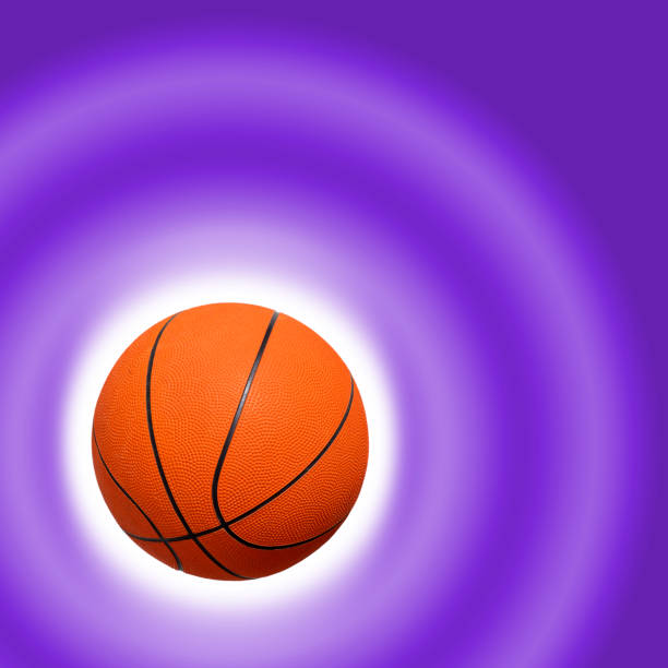 istock Basketball on a purple color gradient background 1207579108