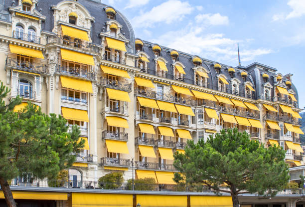 Luxury hotel in Montreux, Switzerland Famous luxury hotel in Montreux with yellow balcony, Switzerland montreux stock pictures, royalty-free photos & images