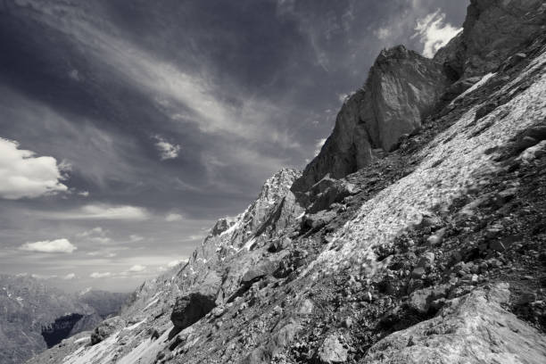 istock Rocks with snow at sun day 1207584495