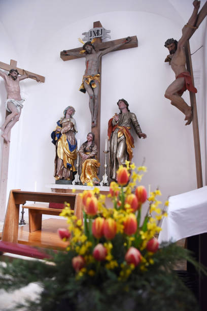 istock Many churches in easter time are decorated with spring flowers, in this case with a bouquet of tulips. 1207584660