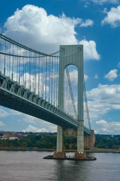 istock Tower and Span of Bridge Over Shipping Channel 1207586201