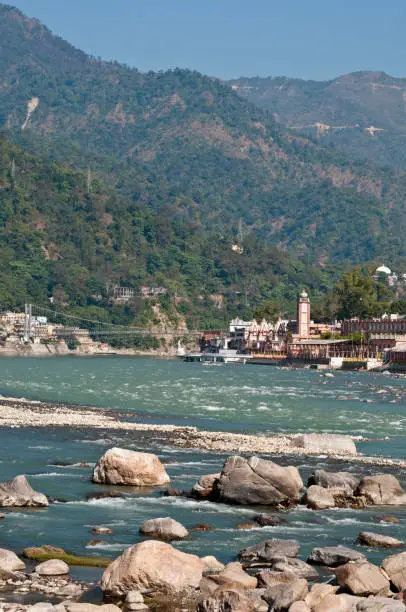 View of the Ganges river, Ram Jhula bridge and the mountains, Rishikesh, Uttarakhand, India