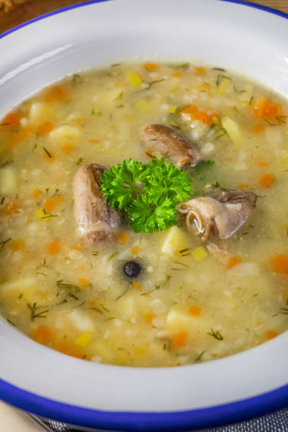 istock Polish barley soup with vegetables and chicken heart. 1207597540