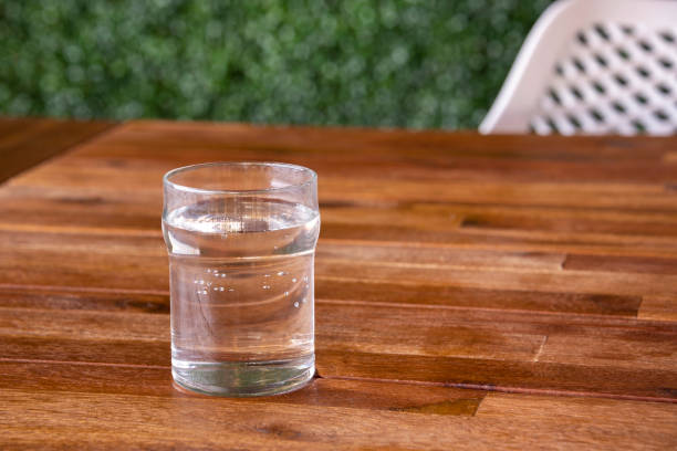 istock Glass of Water on a Table 1207600738