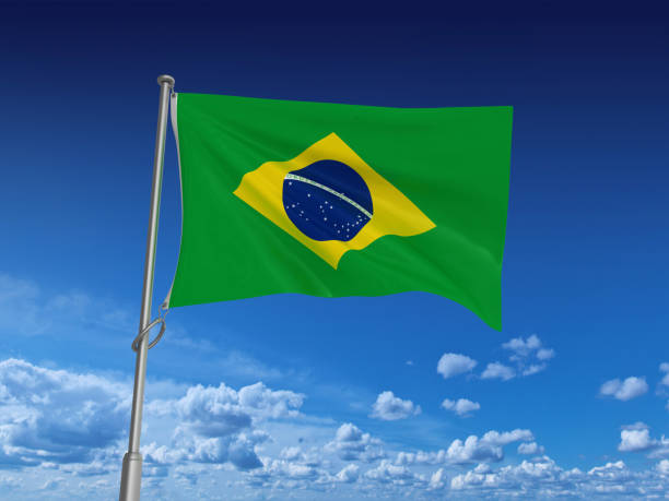 istock BRAZILIAN Flag on Sky - 3D Rendering 1207600808