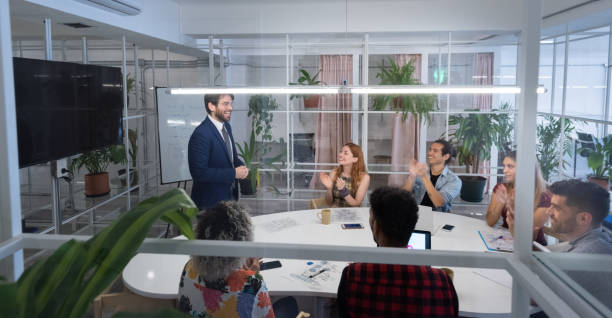 istock Multi ethnic business team meeting 1207601844