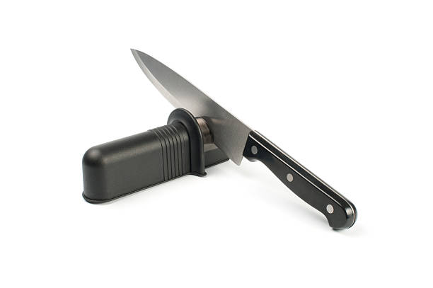 Grindstone and knif Grindstone and knife isolated on the white background knif stock pictures, royalty-free photos & images