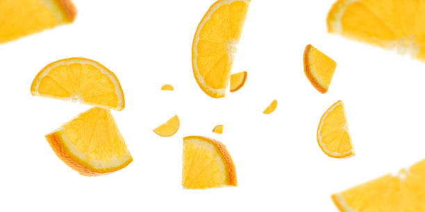 istock Sliced fruit falling background. Orange citrus tangerine flight in air with clipping path. 1207610000