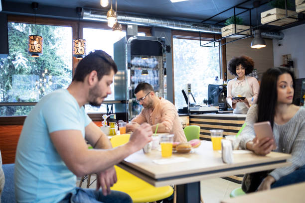 istock People having lunch in a bar 1207615171