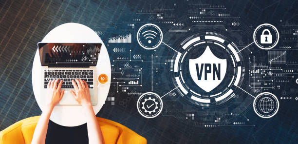VPN concept with person using a laptop stock photo