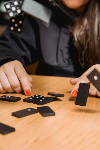 istock The wooden domino blocks falling down 1207617105