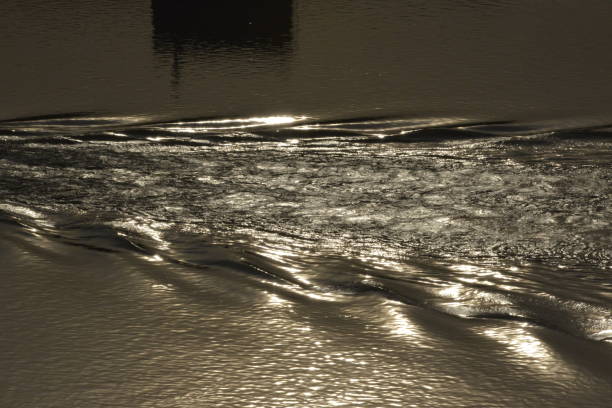 istock Waves on the water surface, behind the boat 1207629288