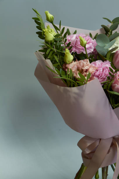 istock Beautiful bridal bouquet in vintage style, light gray background, selective focus 1207631271