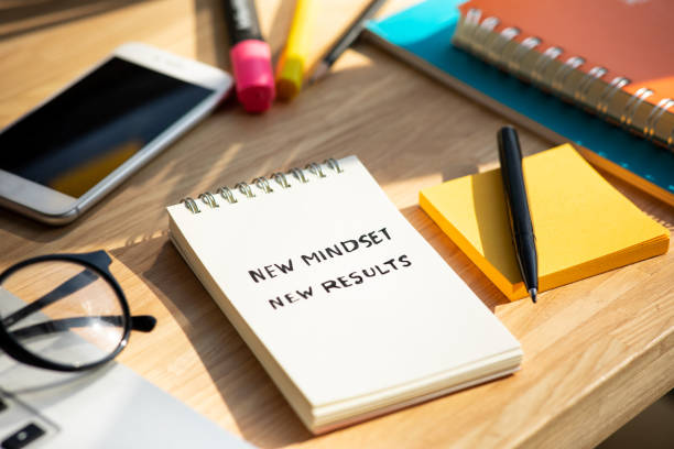 New mindset new results concepts with text on notepad on desk New mindset new results concepts with text on notepad on desk. positive thinking and motivation of business. philosophy photos stock pictures, royalty-free photos & images