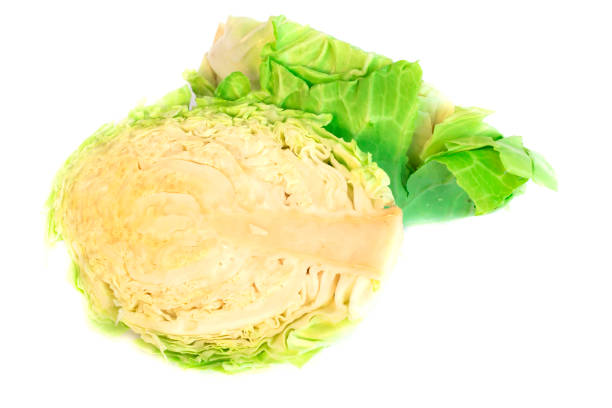 istock Cabbage Cut in half Fresh from the garden 1207640569