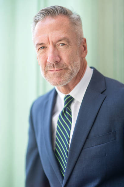 istock Handsome mature businessman at work 1207640901