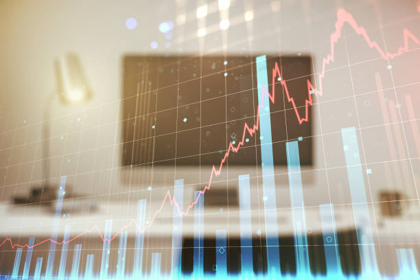 istock Abstract creative financial graph on modern laptop background, financial and trading concept. Multiexposure 1207644853