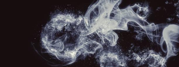 istock Abstract smoke floating in the dark 1207652474
