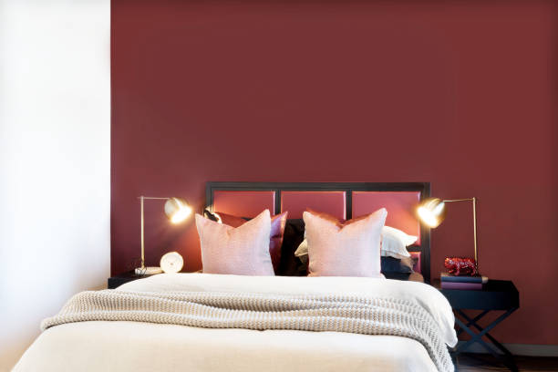 istock Classic bedroom closeup with flashing table lamps 1207660045