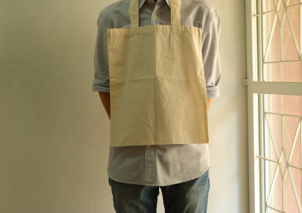 istock Reusable cotton cloth bag, climate change concept 1207664212