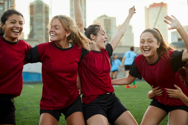 istock Friends celebrating scoring a goal in a soccer match. 1207665687