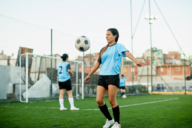 istock Soccer player controlling a ball in a training. 1207665725