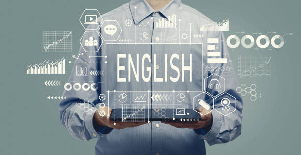 istock English concept with man holding a tablet 1207669496