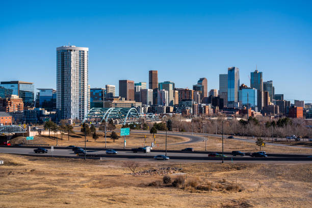 istock Denver skyline and busy traffic 1207673282