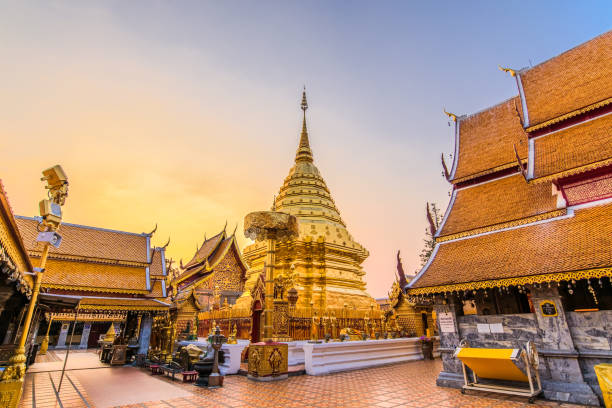 Wat Phra That Doi Suthep Wat Phra That Doi Suthep with golden morning sky, the most famous temple in Chiang Mai, Thailand wat stock pictures, royalty-free photos & images